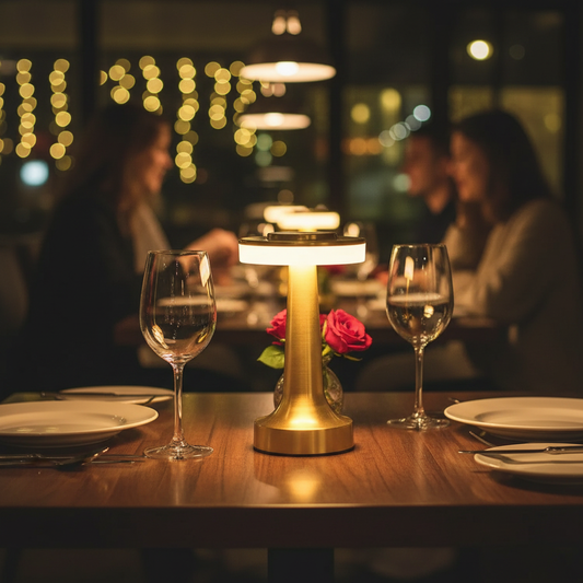 Gold retro rechargeable table lamp on restaurant dining table creating romantic atmosphere